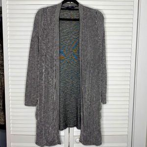 Long black and white striped cardigan with packets brand ‘gyft’ size L.